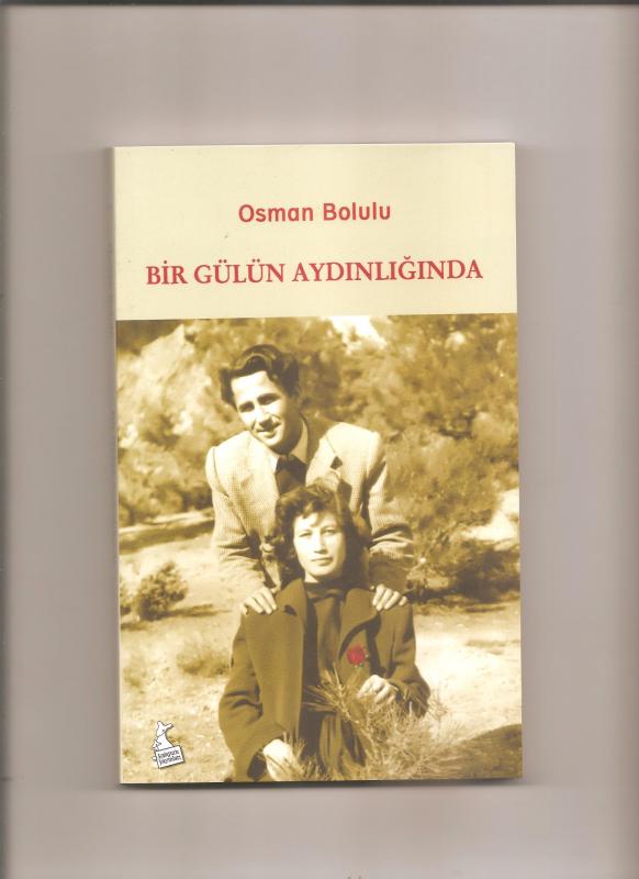 BİR GÜLÜN AYDINLIĞINDA 